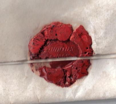 A broken wax seal on a letter from Loudoun Castle, Galston East Ayrshire, Scotland. This image is in the public domain.